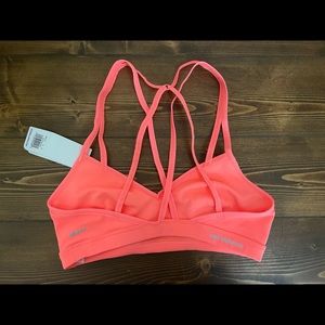 NWT medium New balance coral sports bra cross back